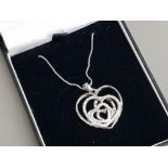 Silver and CZ set heart shape pendant and chain, 5.1g gross