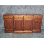 A stained pine sideboard 173 x 87 x 46cm.