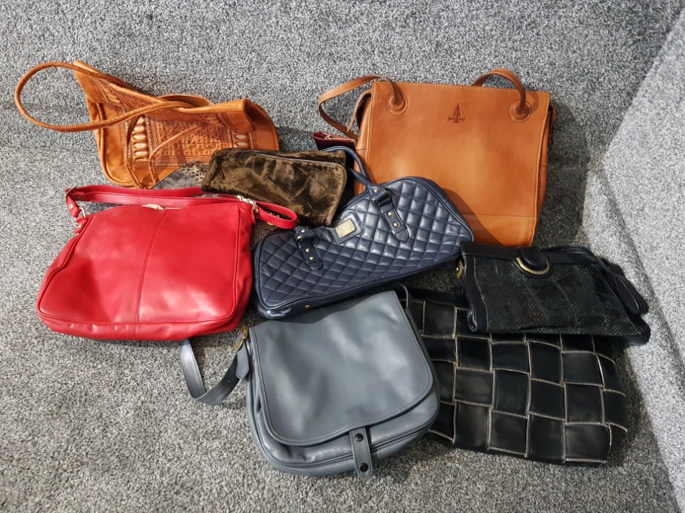 A quantity of ladies leather handbags, and others.