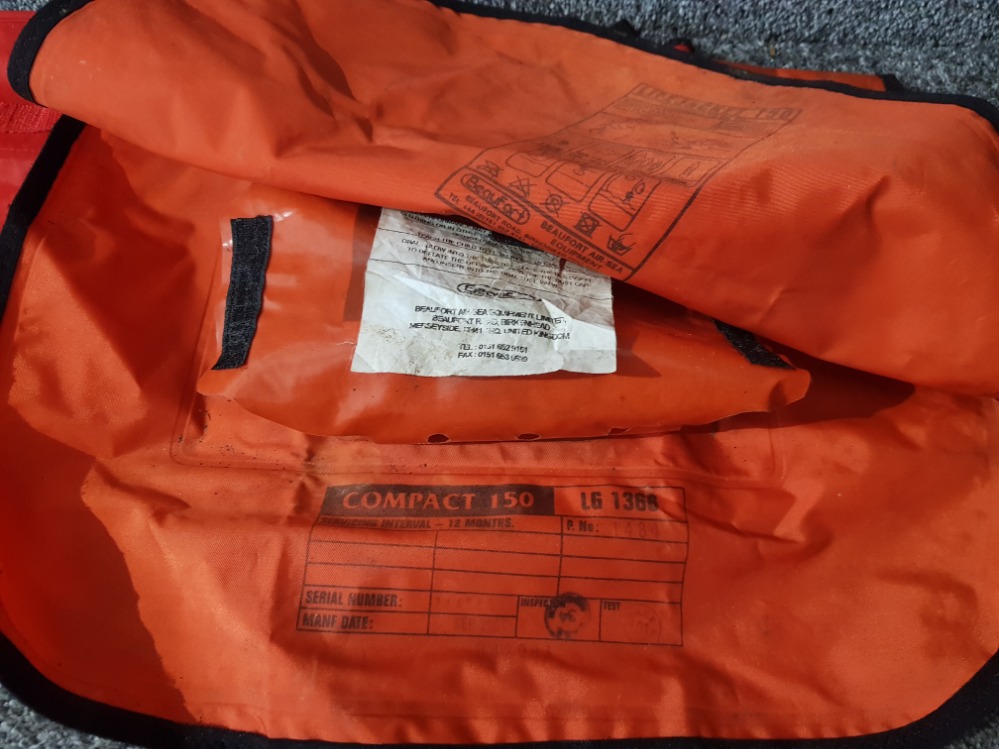 An RLNI child's inflatable life jacket with bag. - Image 2 of 2