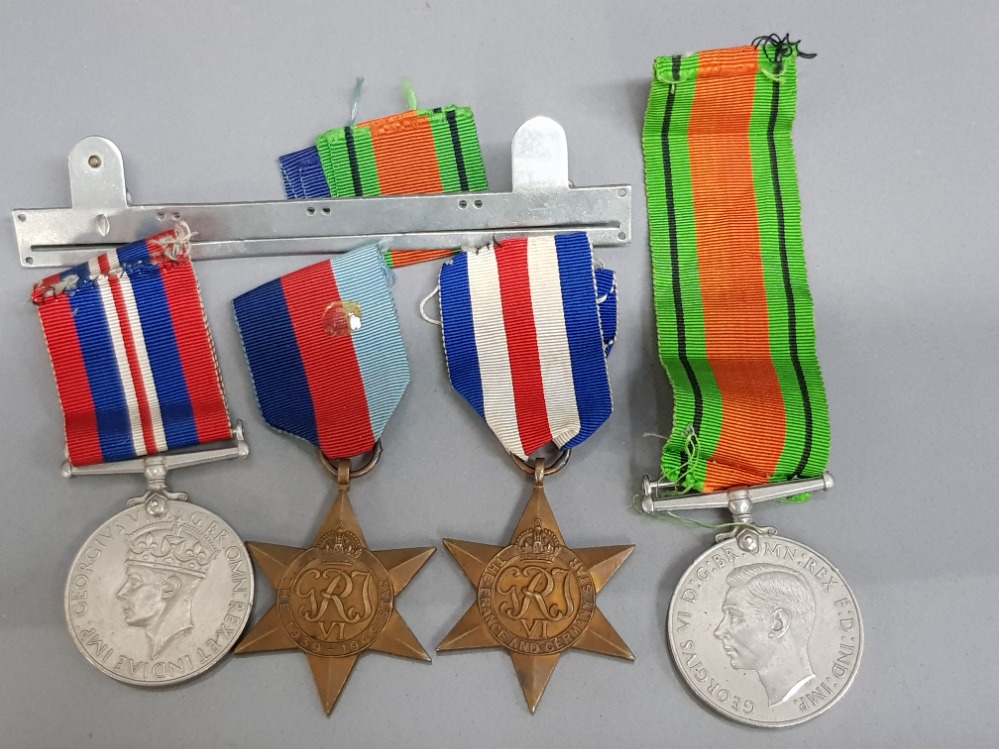 Set of 4 WW2 medals includes 1939-1945 defence medal, the France and Germany star plus the 1939-1945