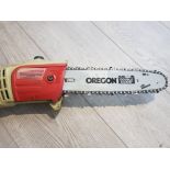 An Eckman Oregon double guard telescopic pole chain saw.