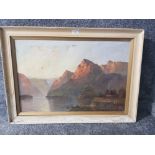 An oil painting by Joel Owen, mountainous lake scene, signed and dated 1927, 49.5 x 75cm.