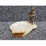 An onyx ashtray with cold painted bronze figure of a fisherman.