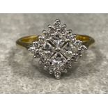 Ladies 18ct gold Diamond cluster ring. Comprising of 4 Princess cut diamonds and surrounded by 20