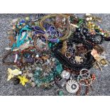 Box of miscellaneous costume jewellery mainly necklaces and brooches