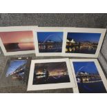 Four signed unframed photographs of Newcastle by David West, and two unsigned.