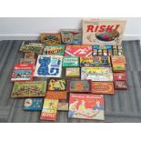 Box containing 28 vintage boardgames including Risk, Minature Badminton, Xat and Mouse etc