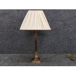 Super polished brass square column table lamp with pleated shade.