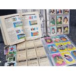 2 albums of vintage football cards also includes the Sun Encyclopedia & soccer stamp album -