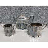 Three piece fancy silver plated Britannia metal tea service.