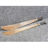 2 ornamental machete's with animal handle design