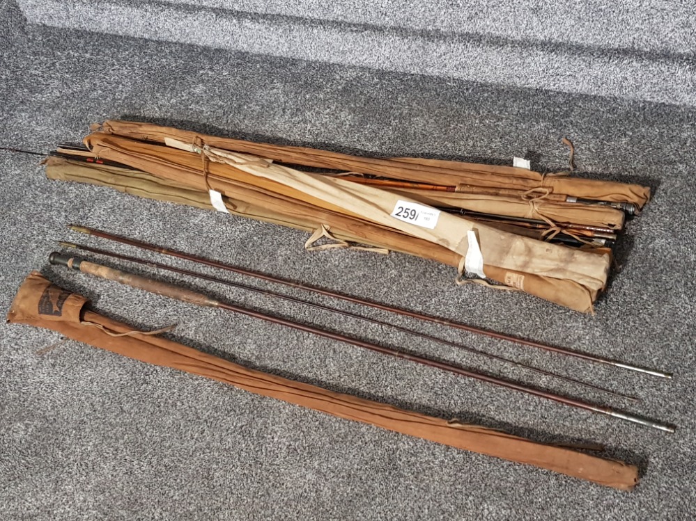 Bundle of vintage fishing rods by Farlow and Mortan etc