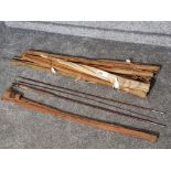 Bundle of vintage fishing rods by Farlow and Mortan etc