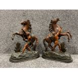 Pair of bronze effect spelters of raging horses (44cms)