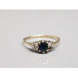 9ct yellow gold sapphire with 3 diamonds to each side (1 diamond missing) size m 1g gross