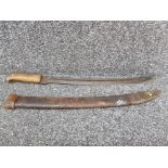 An antique small sword in leather scabbard.