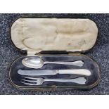 A George V silver christening set by C W Fletcher & Son Ltd, Sheffield 1921, the knife with mother