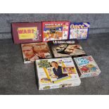 Box containing 7 boxed vintage games including Top Cat the santa claws scam, Wari, every second