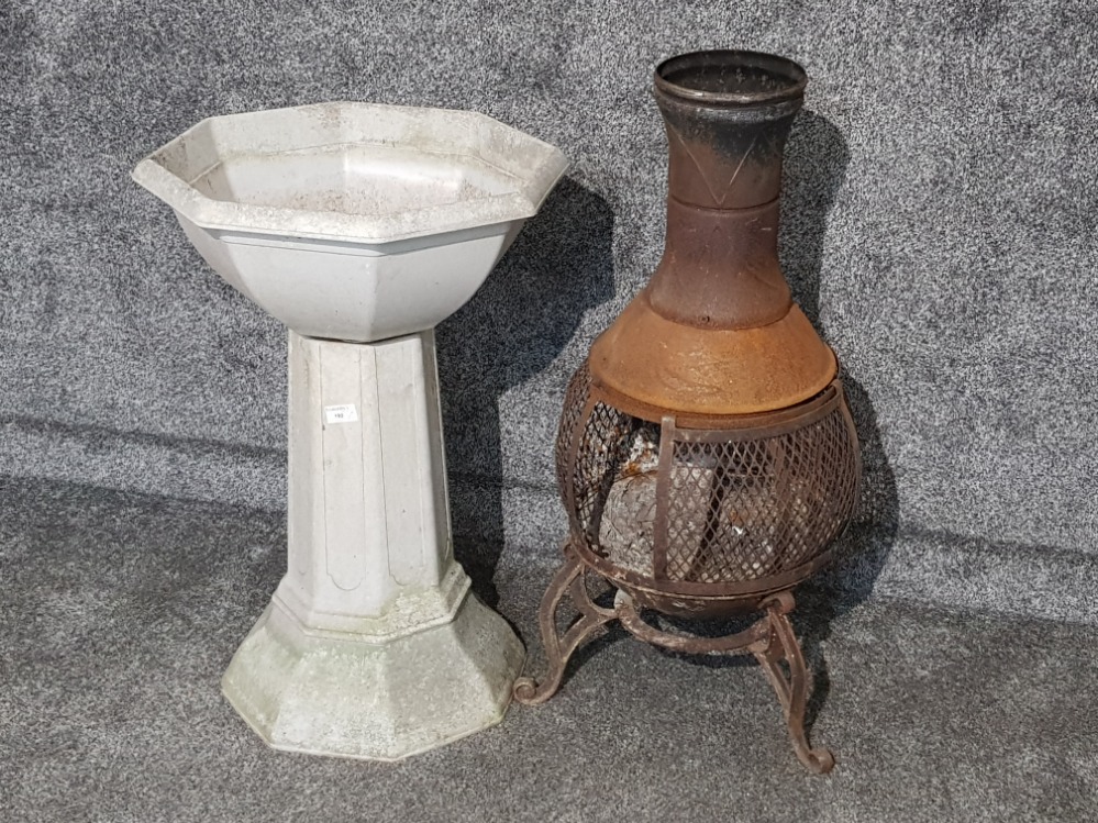 Outdoor Metal chiminea, height 85cm together with large plastic stone effect planter