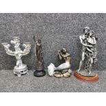 A bronzed figure of a maiden, two resin figures of a mermaid and a couple, together with a three