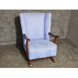 Modern upholstered wing backed rocking chair with mahogany frame