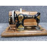 Vintage English made Jones sewing machine with original carry case, including key