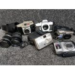 Kodak, minolta and olympus cameras, also includes 2 camera lenses