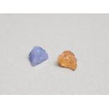 3.71ct rough cut natural tanzanite stone together with 3.72ct rough cut natural topaz both with