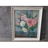 An oil painting by D E Sargeant 'rhododendrons in a vase' signed and dated 1957 56 x 47cm.