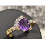 Ladies 9ct gold Amethyst and CZ ring. Size L1/2