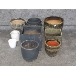 Ceramic and other plant pots of various sizes and designs.