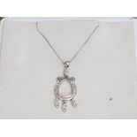 9ct white gold diamond set pendant & 9ct chain, 2.6G gross