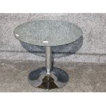 A contemporary glass topped circular occasional table 60 x 50cm.