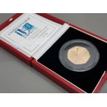 UK gold 2000 public library milestones 22ct 50p gold coin, 15.50 grams, in original case with