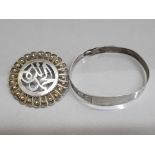 Adjustable silver bracelet with vacant cartouche 7.3g together with a middle eastern wireworked