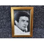 Studio photograph with autograph of Albert Finney.