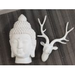 Contemporary deer head wall hanging in white together with large buddha head