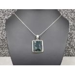 Ladies silver pendant and chain. Comprising of a square pendant set with black stone complete with