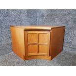 A Nathan Furniture corner cupboard 98 x 51 x 83cm.