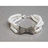 Silver and pearl bracelet set with marcasites