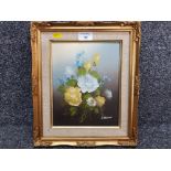 An oil painting by J Howard, still life of flowers 24 x 19cm