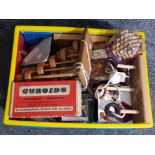 Crate full of vintage wooden puzzle games