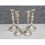 Pair of silver plated Lanthe of England candlesticks together with a further pair of silver plated