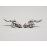 Pair of silver snake earrings set with marcasites 6.84g gross