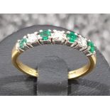 Ladies 18ct gold Emerald and diamond 7 stone ring. 2.2g size J