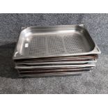 Ten stainless steel serving dishes and bain Marie.
