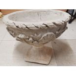 Large stone garden planter on pedestal base