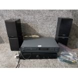 Cambridge Audio Amp, NAD CD player with remote, and two pairs of speakers by Panasonic and Hitachi.