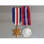 George VI 1939-1945 WWII service war medal & The france and Germany star, both with original
